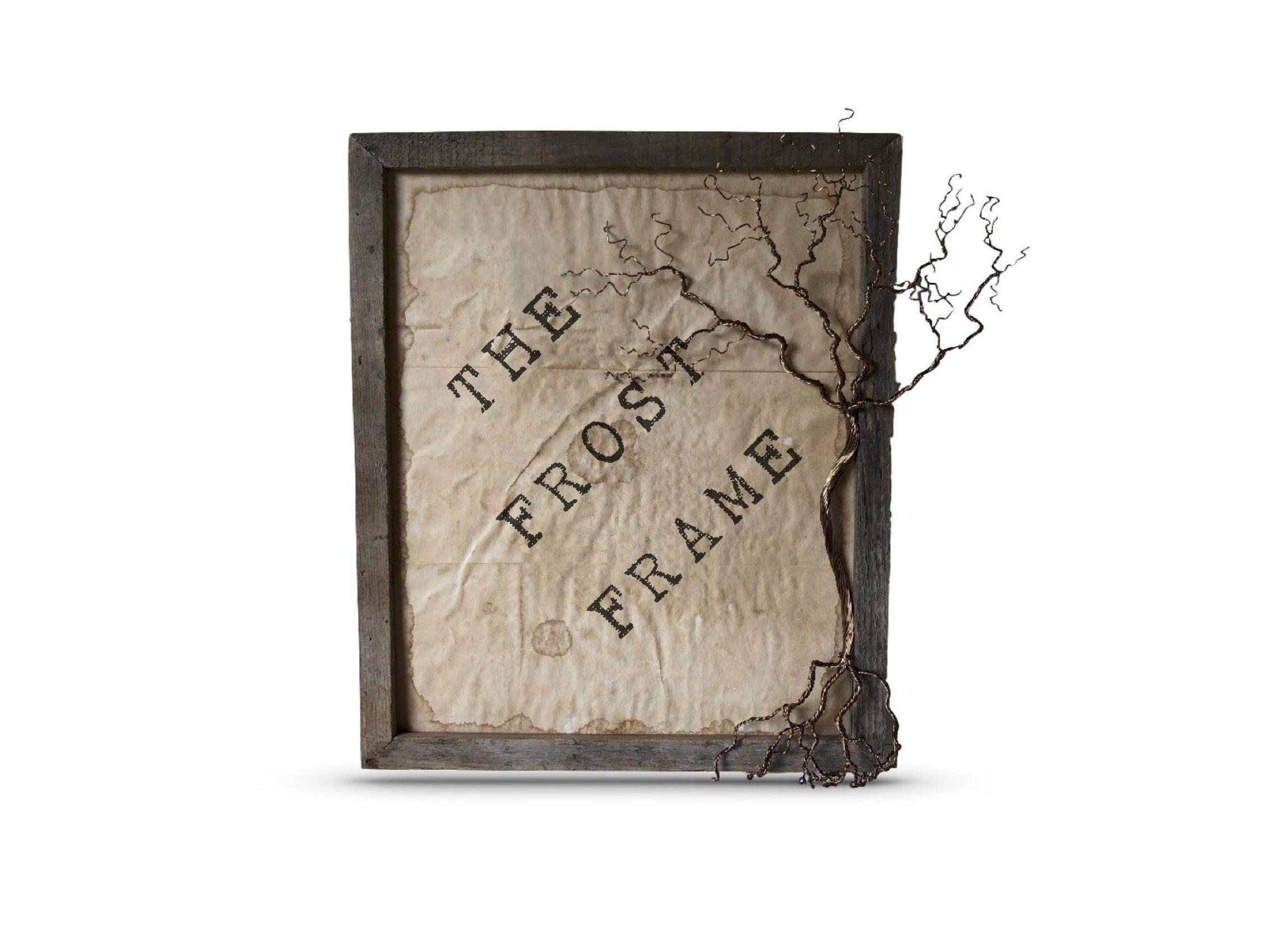 Decorative frame with 'The Frost Frame' text on a white background. A Wire tree is attached to the side of the frame.