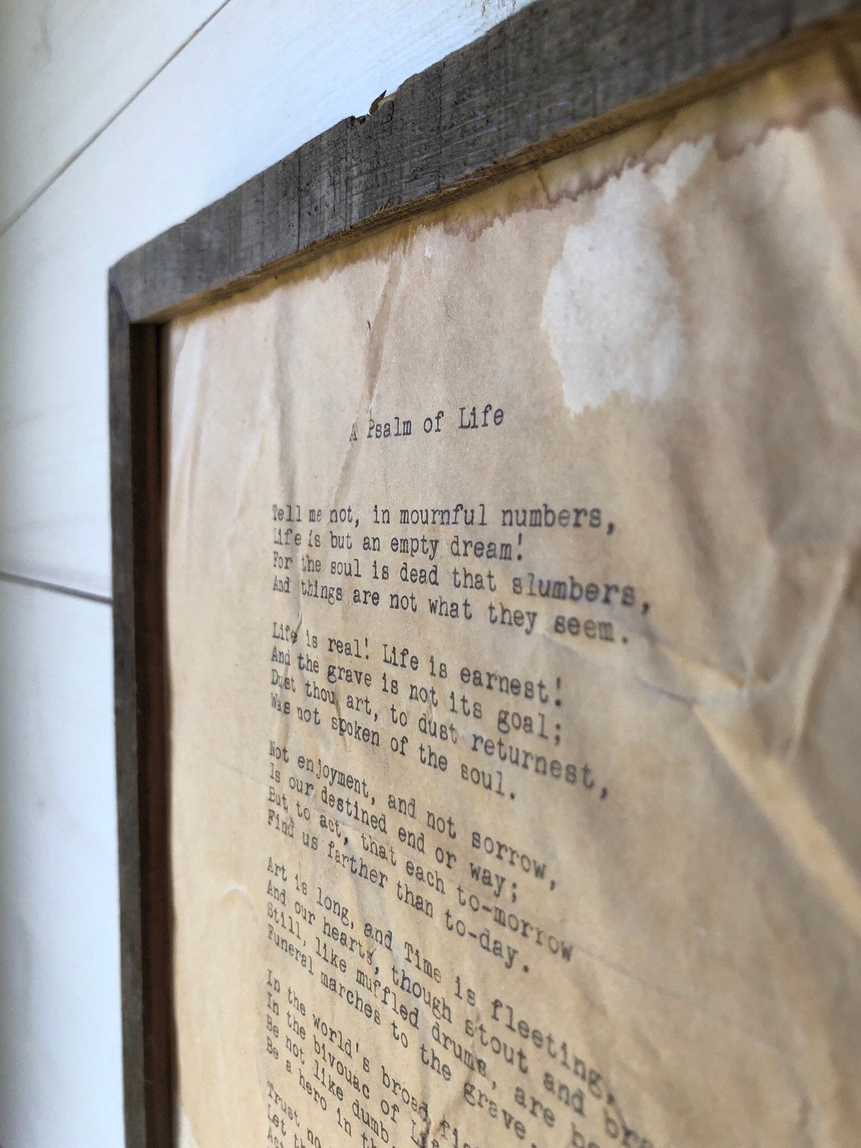 Psalm of Life by Henry Wadsworth Longfellow. Vintage framed poem print. Close up of rustic wood frame.