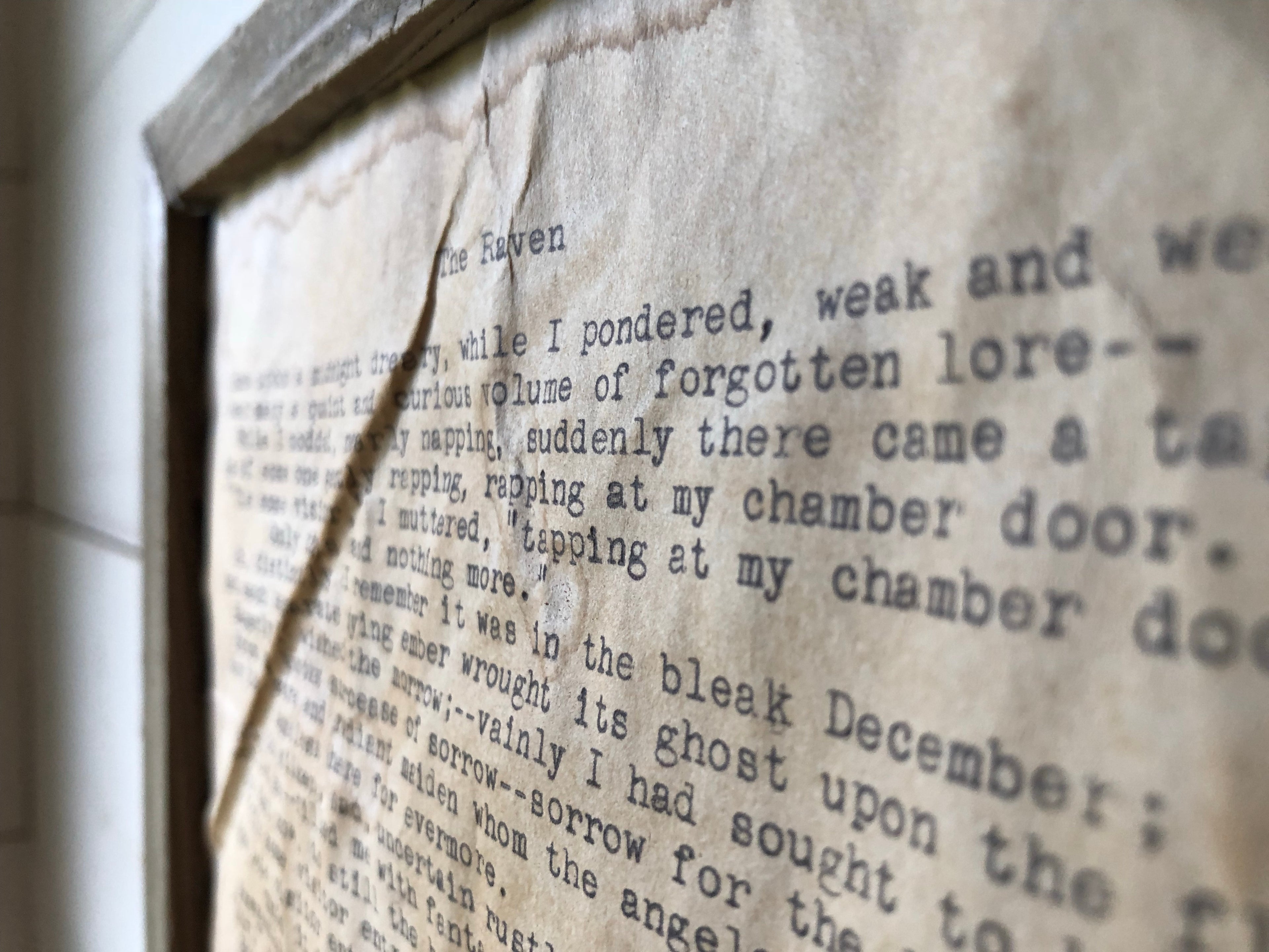 The Raven by Edgar Allan Poe. Vintage poem print. Typewritten. Close up of text.