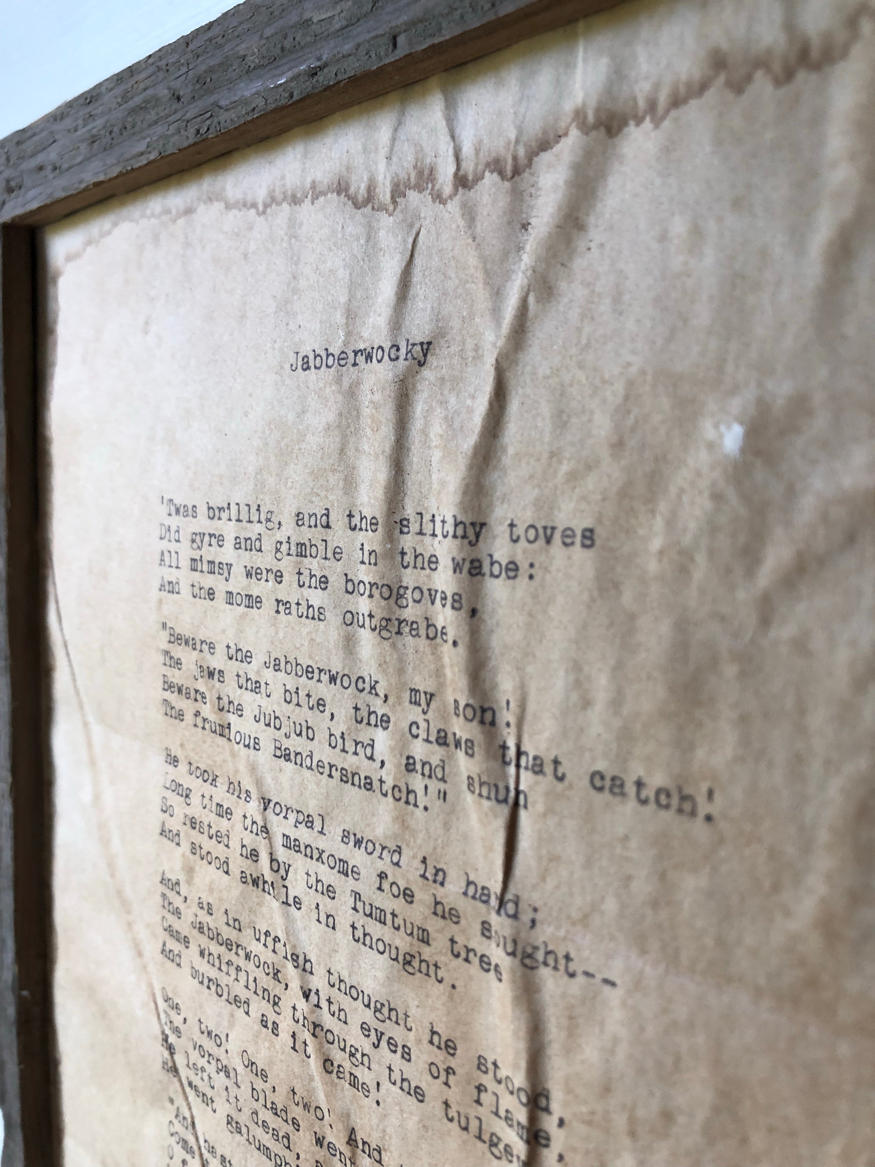 Jabberwocky by Lewis Carroll. Vintage poem print. Typewritten. Close up of frame.