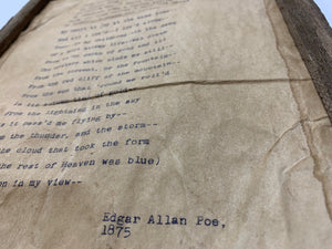 Alone by Edgar Allan Poe. Framed poem print. Typewritten text close up. 